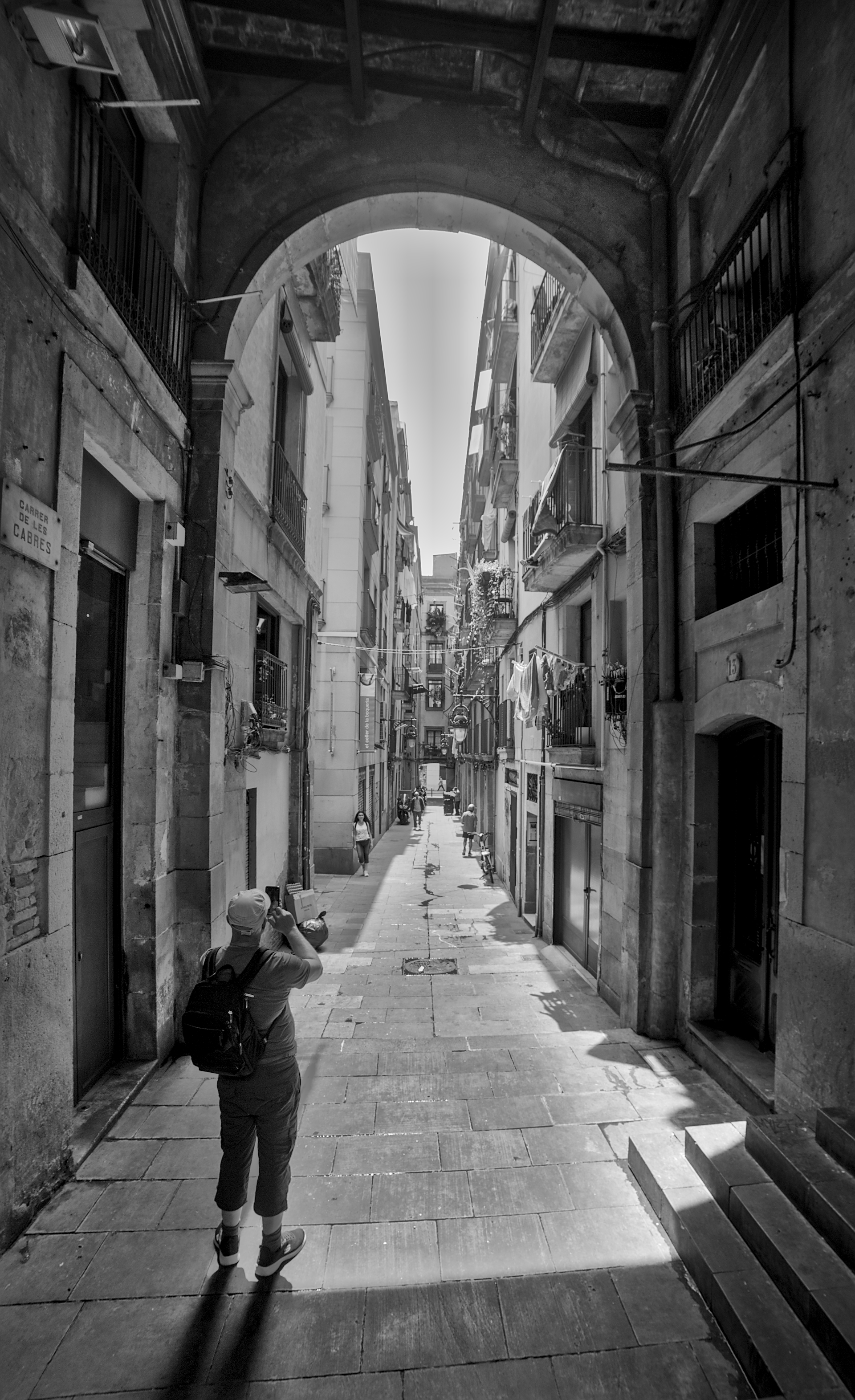 Photographer in alley